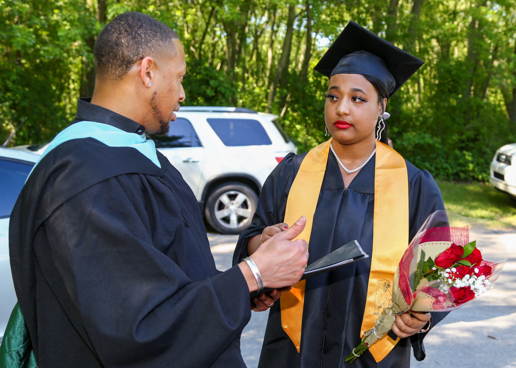 The last graduating class from Roosevelt College and Career Academy graduates